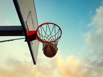 Low angle view of basketball hoop against sky