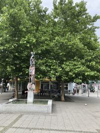 Statue on street in park