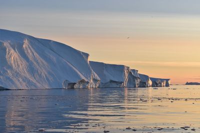 Scenic view of sea against sky during winter