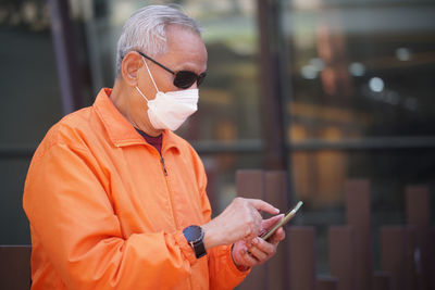 Young man using mobile phone
