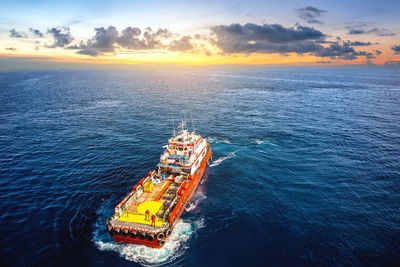 High angle view of sea against sky during sunset