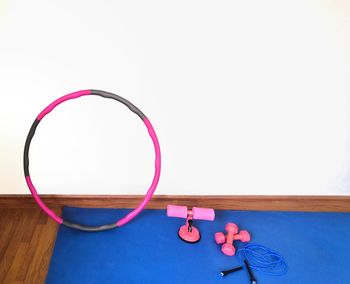 High angle view of bicycle on table against white background