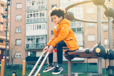 Cute boy enjoying in playground