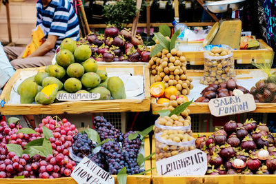 Various fruits for sale at market stall