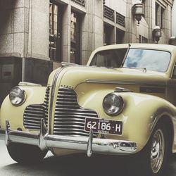 Vintage car on street in city
