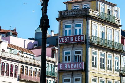 Low angle view of building against blue sky