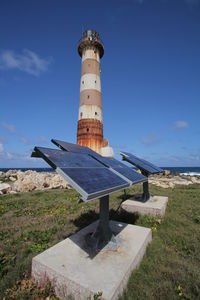 Lighthouse against blue sky