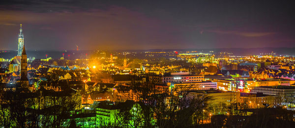 Illuminated cityscape at night