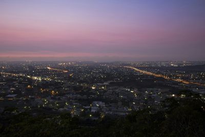 Aerial view of illuminated cityscape