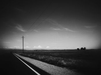 Road passing through field