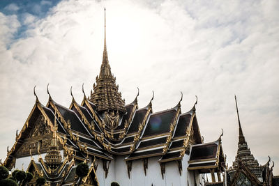 Low angle view of temple against building