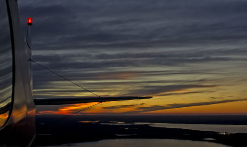 Scenic view of dramatic sky over sea during sunset