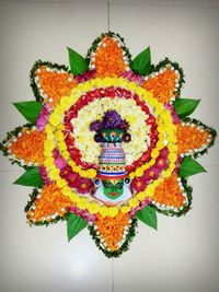 Close-up of multi colored flowers on table