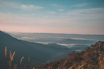 Scenic view of mountains against sky during sunset