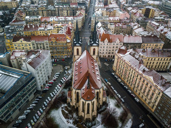 High angle view of illuminated street amidst buildings in city