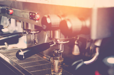 Close-up of coffee maker in cafe