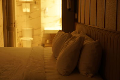 Bedroom with white toilet in it