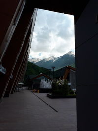 Houses and buildings against sky