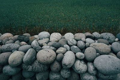 High angle view of stones on field