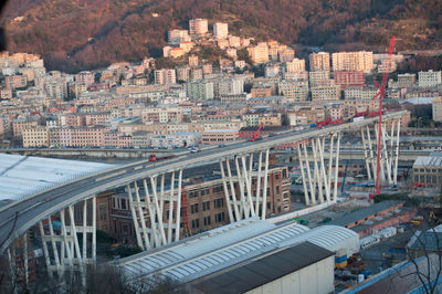 High angle view of bridge and buildings in city