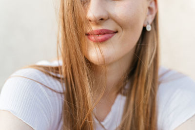 Portrait of a beautiful teenage girl smiling and looking at camera