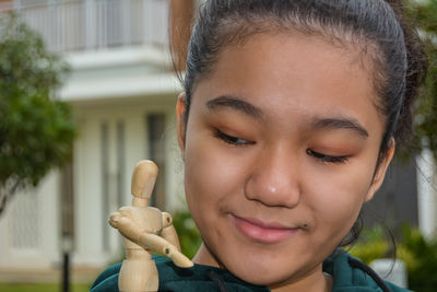 Close-up portrait of smiling woman