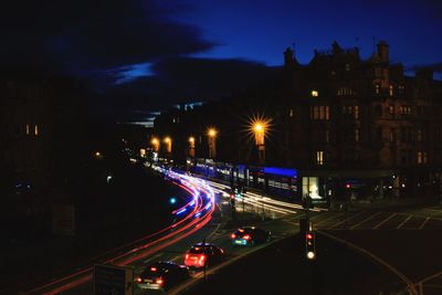 Light trails on city street at night