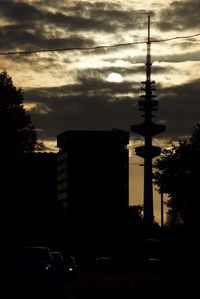 Silhouette of trees against sky at sunset