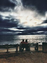 Scenic view of sea against cloudy sky