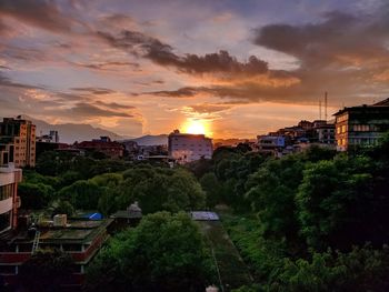 High angle view of townscape against sky at sunset