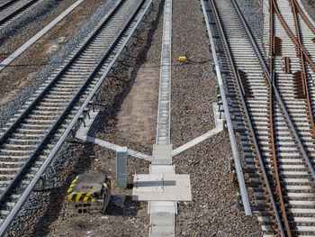 High angle view of man standing on railroad track