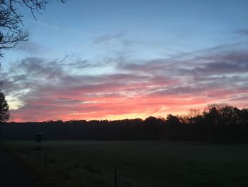 Scenic view of silhouette landscape against sky during sunset