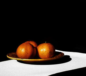 Close-up of fruit on table