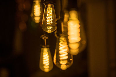 Close-up of illuminated light bulb