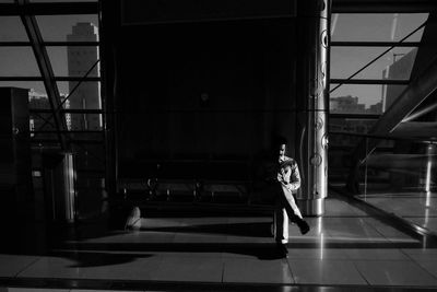 Man walking in corridor