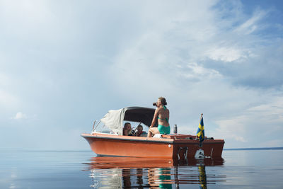 Family at small boat