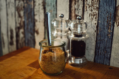 Close-up of drink in glass jar on table