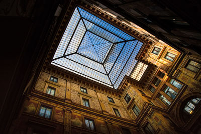 Low angle view of skylight in building