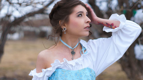 Woman looking away outdoors