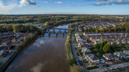 High angle view of river passing through city