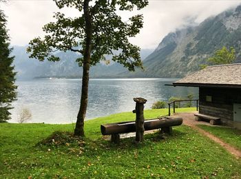 View of calm lake against mountain range