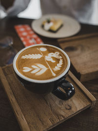 Coffee cup on table