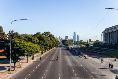 View of city street against clear sky