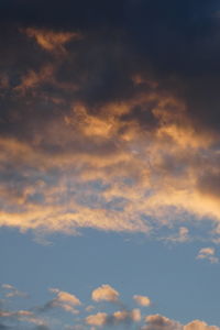 Low angle view of cloudy sky during sunset