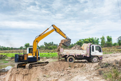 View of construction site on field against sky