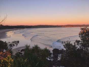 Scenic view of beach during sunset