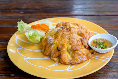 Close-up of food served on table