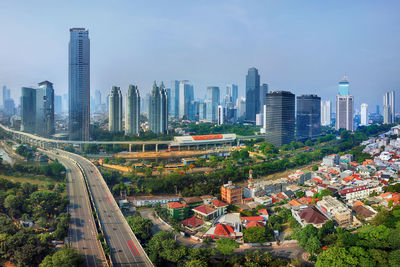 Modern buildings in city against sky