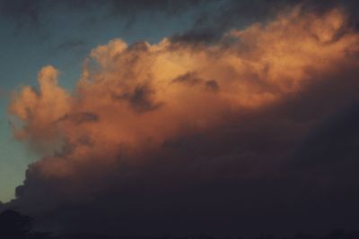 Low angle view of dramatic sky during sunset