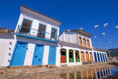 Low angle view of building against blue sky